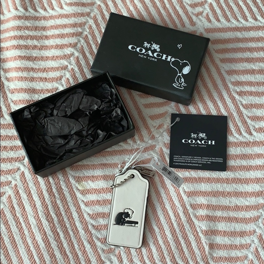 Coach x Peanuts White Leather Schroeder Tag